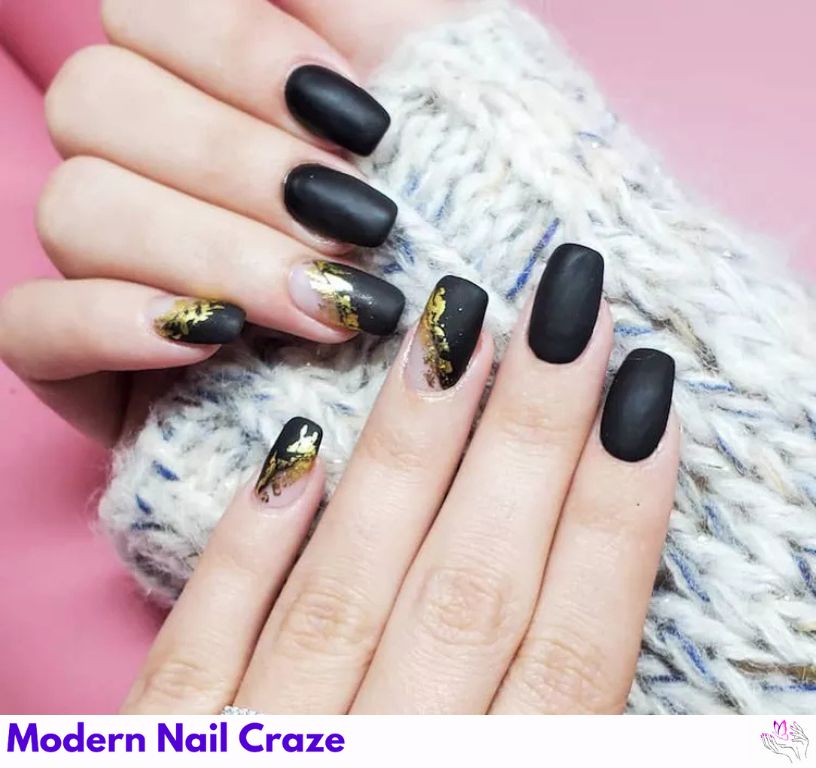 Elegant matte black nails with design with gold foil accents.