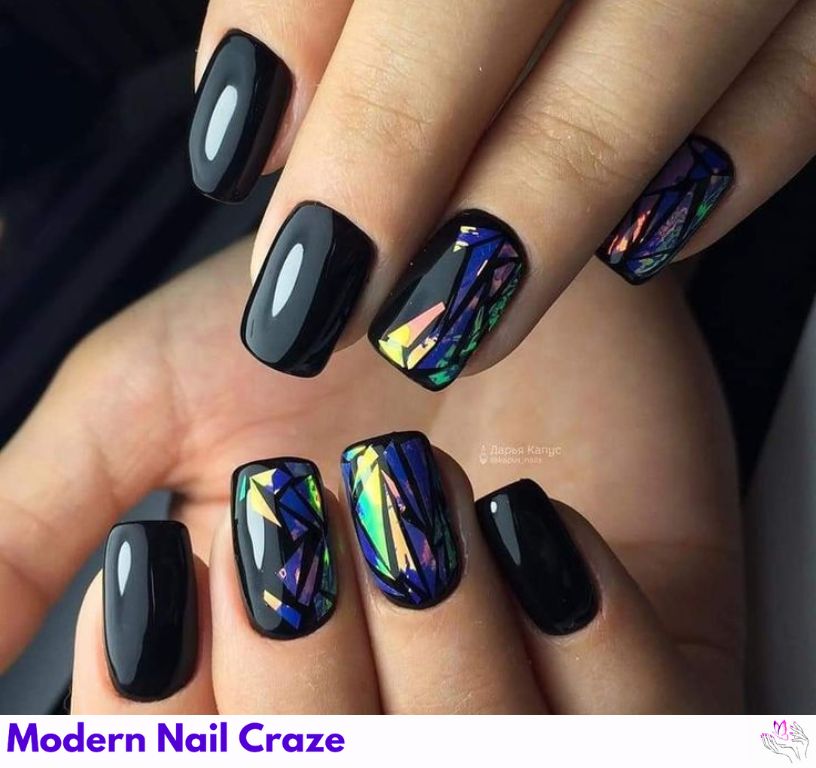 Trendy matte black nails with design featuring holographic details.