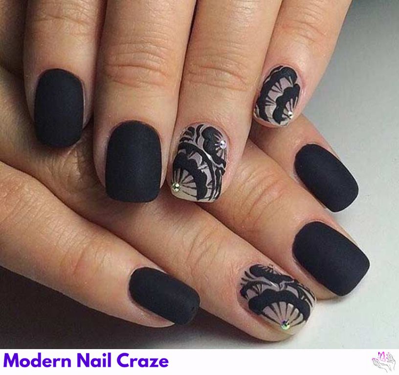 Chic matte black nails with design paired with pastel florals.