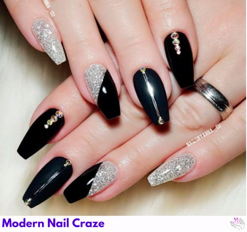 High-contrast matte black nails with design featuring glossy tips.