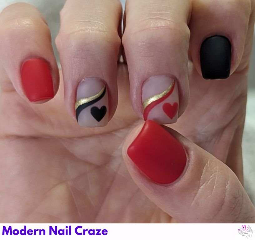 Romantic matte black nails with design featuring hearts.