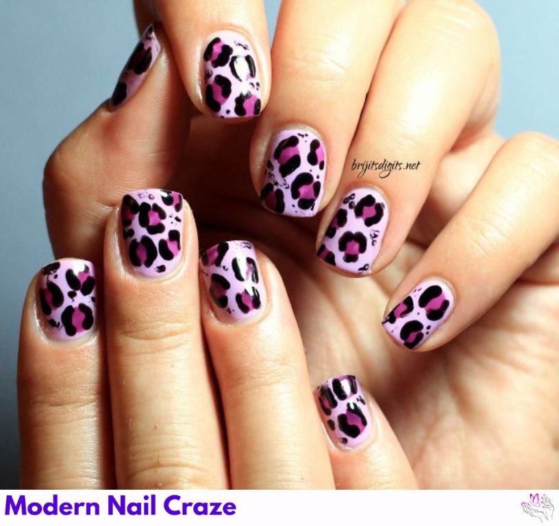 Modern animal print nails featuring zebra and leopard patterns with nude and neon accents.