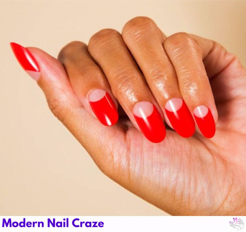 Elegant half-moon manicure with metallic crescent at the nail base over neutral polish.