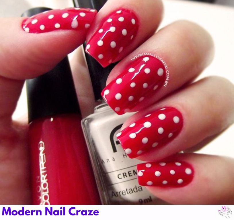 Retro-inspired polka dot nail art with black dots over a pastel base, playful and nostalgic.