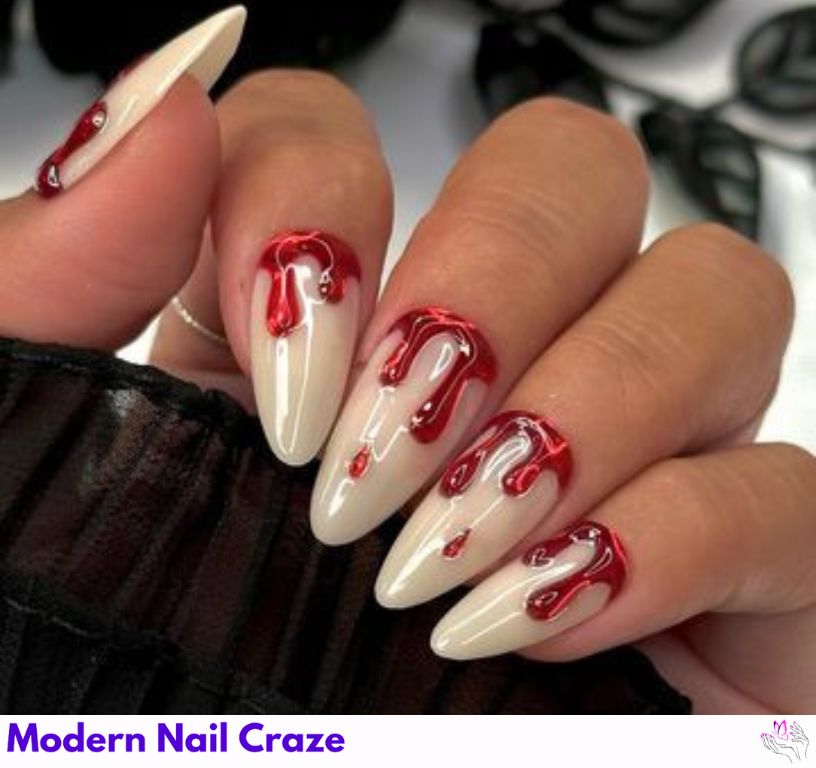 Short nude nails with dramatic red blood drip design, perfect for Halloween manicures.
