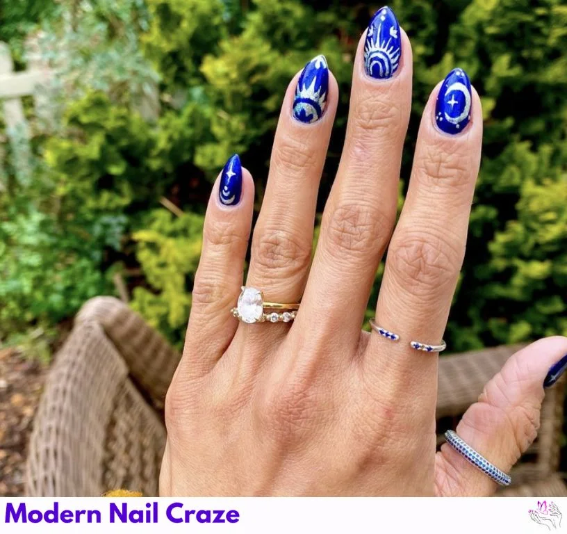 Dreamy blue celestial nails with chrome stars and galaxy gradient