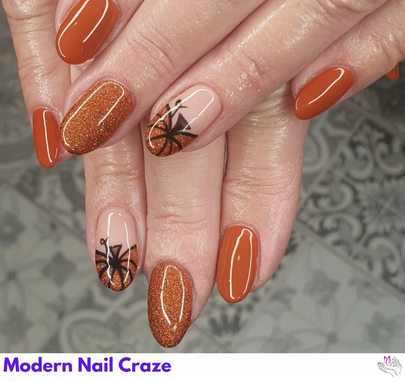 Glossy burnt orange nails with smooth, reflective top coat — perfect for autumn styling.