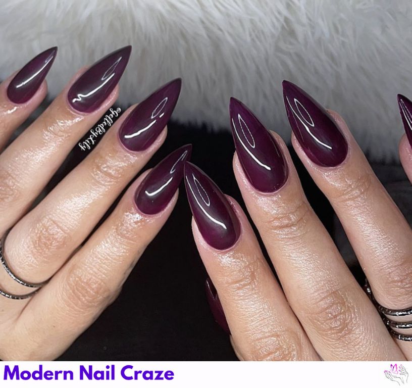 Deep Purple Stiletto Nail Art nail design showing the style, color, and seasonal trend for visual inspiration.