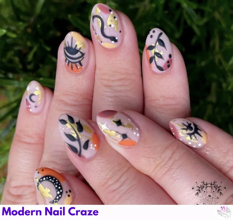 Autumn-inspired celestial nails in burnt orange and bronze tones
