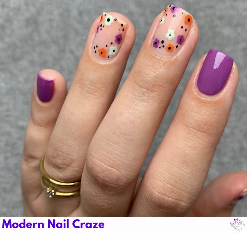 Floral Delight with a Pop of Purple nail design showing the style, color, and seasonal trend for visual inspiration.