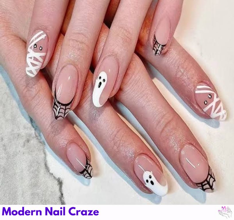 Spooky ghost-themed nails designed for Halloween parties, featuring eerie yet fun nail art.