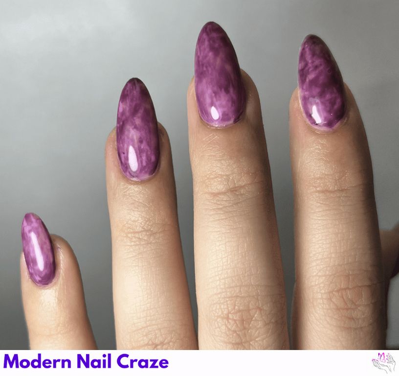 Marble Nail Art in Purple nail design showing the style, color, and seasonal trend for visual inspiration.