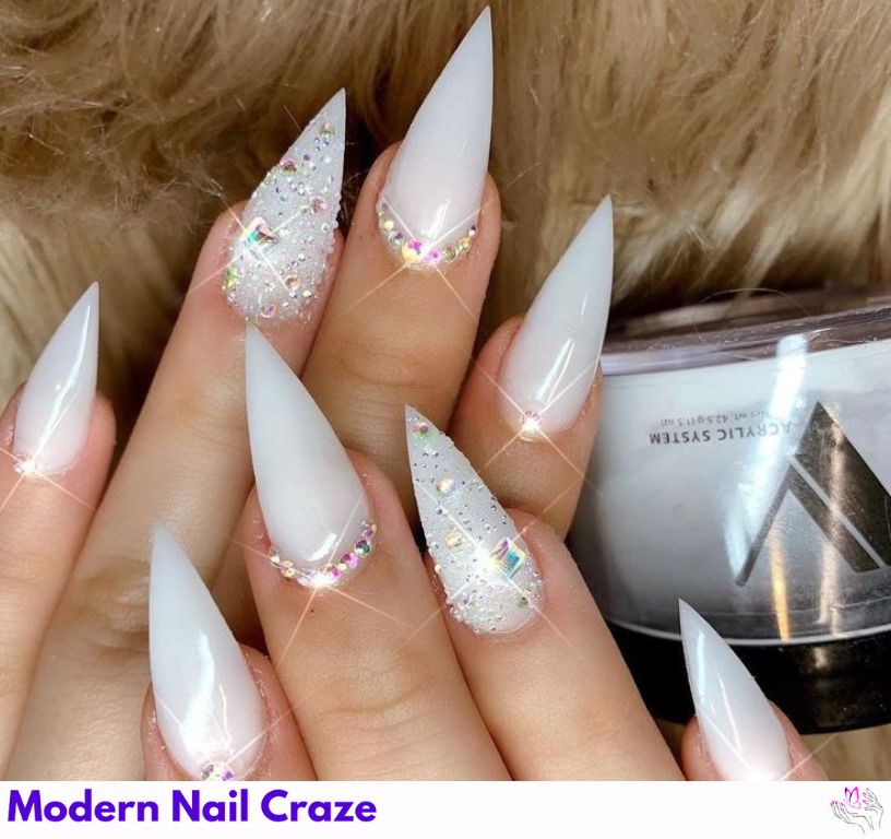 Milky white stiletto nails, clean and chic with minimal modern bridal flair.