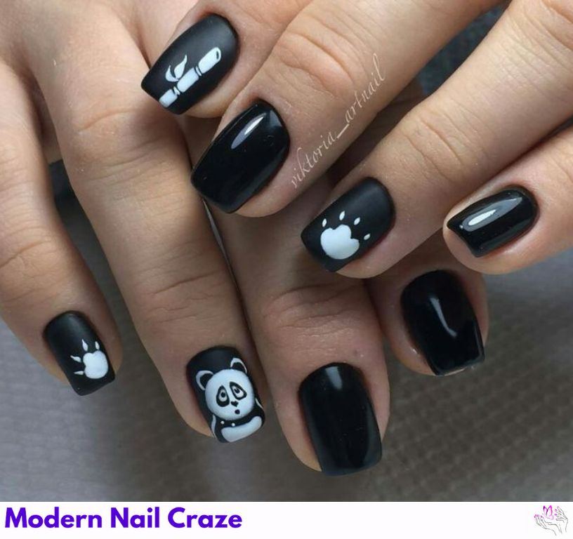 Cute panda faces in black and white nail design.