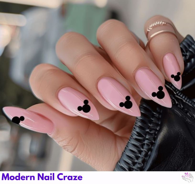 Cute nail design with pink circles as cartoon mouse ears.