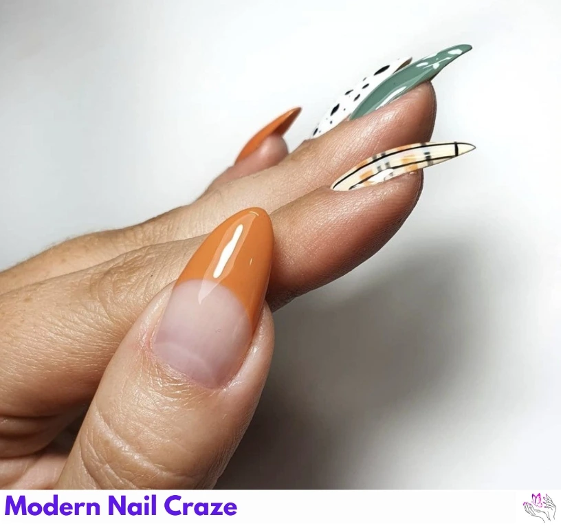 Creative fall nail design with burnt orange, sky blue, and white accents.