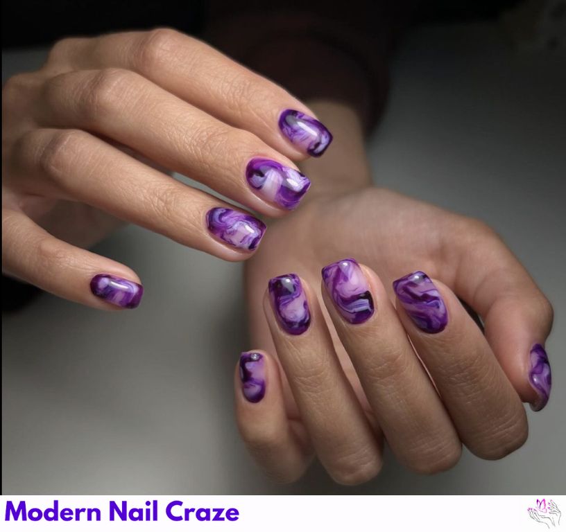Purple Marble Swirl nail design showing the style, color, and seasonal trend for visual inspiration.