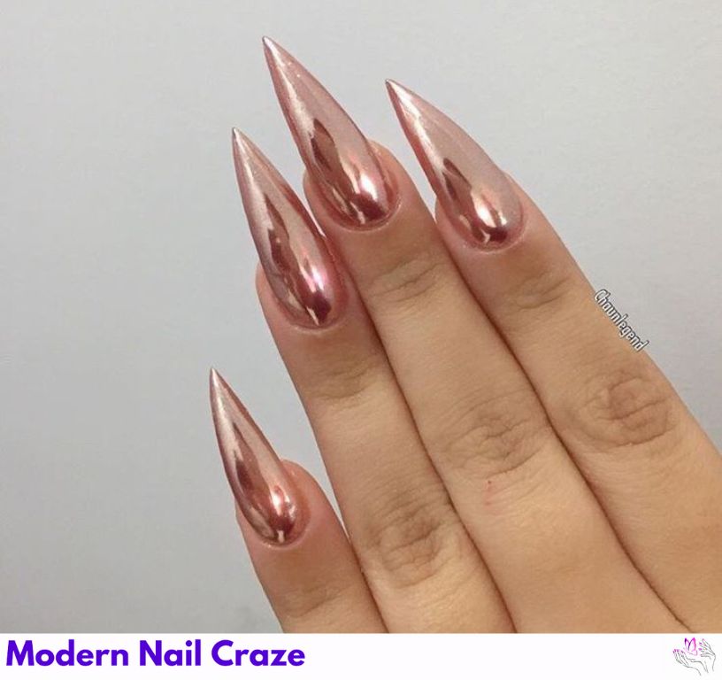 Rose gold glitter nails, shimmery stiletto style for brides or bachelorettes.