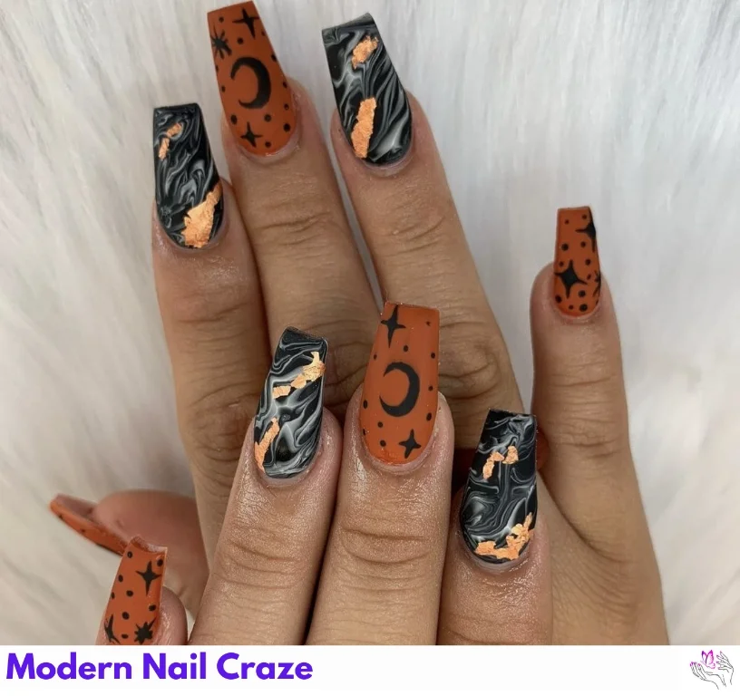 Square-shaped matte burnt orange nails with bold black accents for a Halloween-inspired fall manicure.