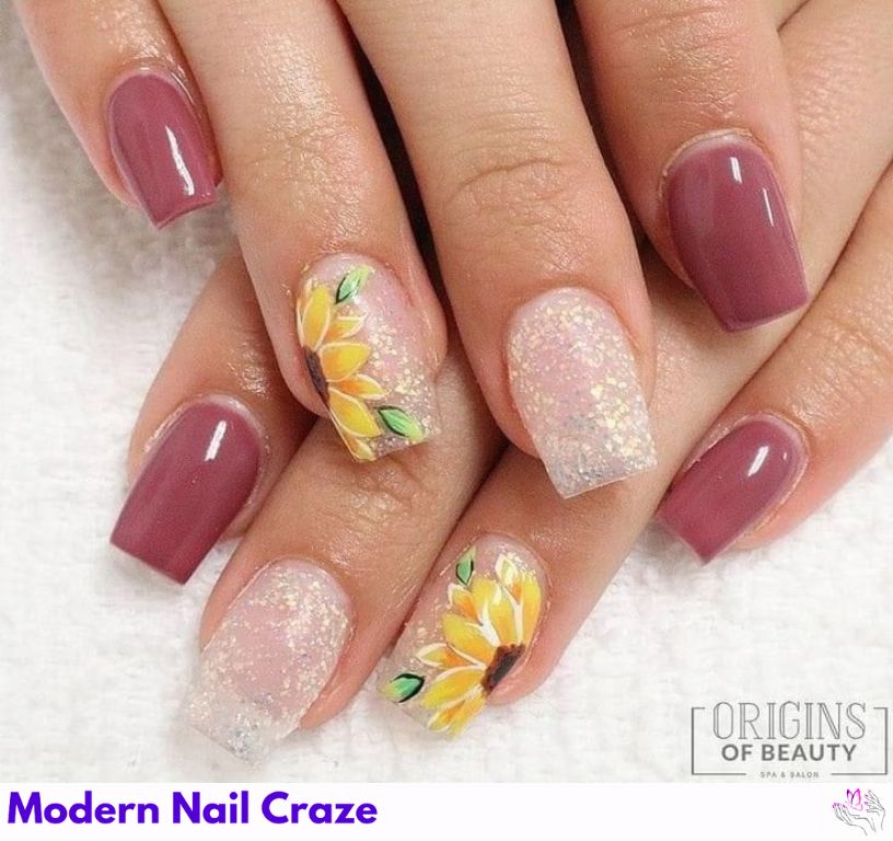 Sunflower nail art with glittered centers adding sparkle to yellow petals
