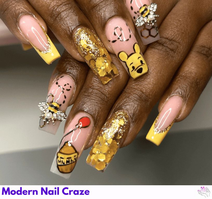 Bling Pooh Nails – Rhinestone and glitter-heavy design with Pooh heads and bees.