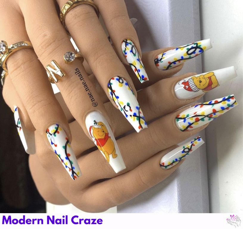 Christmas Pooh Nails – Red and green holiday nails with Pooh in Santa hats.