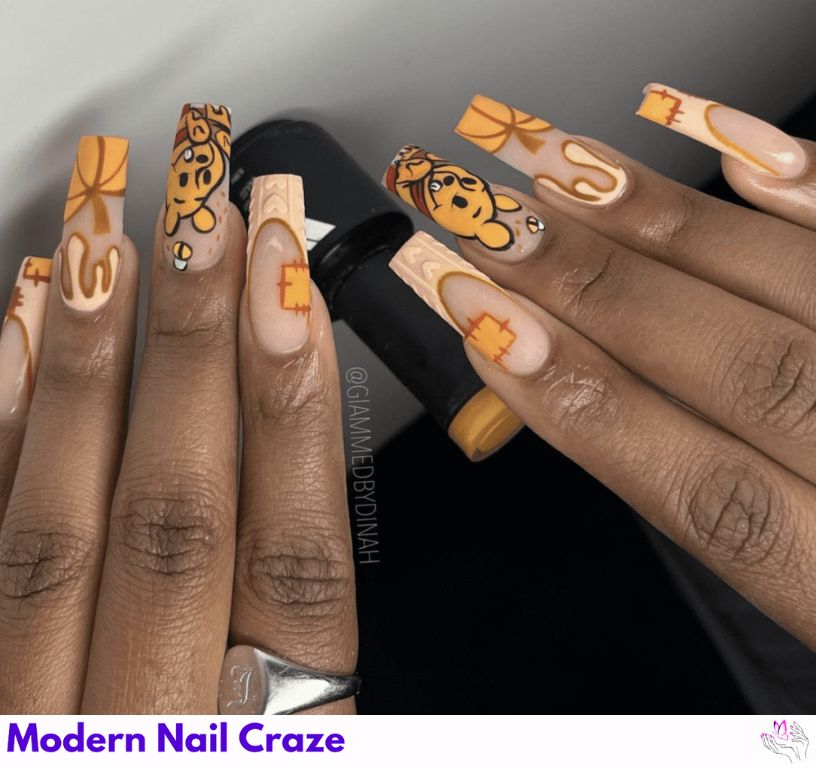 Winnie the Pooh Chrome Nails – High-shine chrome nails with gold honey drip and Pooh face decals.