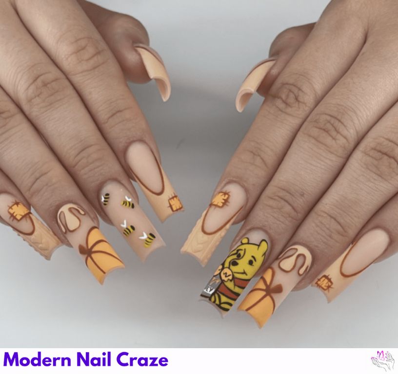 Matte Top Coat Pooh Nails – Soft matte yellow and beige base with subtle Pooh and bees.