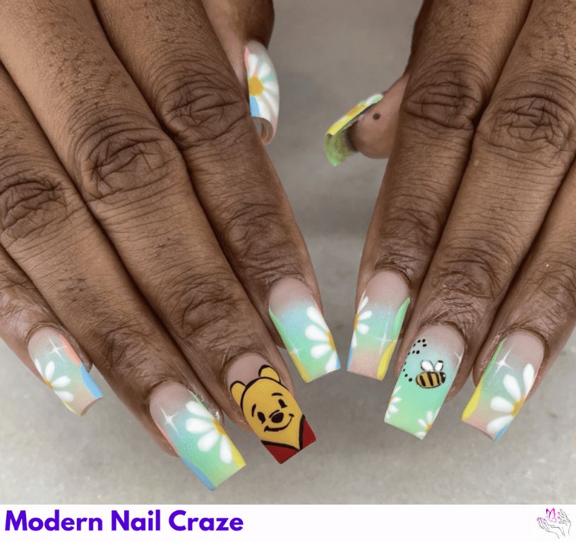 Pastel Winnie the Pooh Nails – Light lavender, mint, and peach nails with characters.