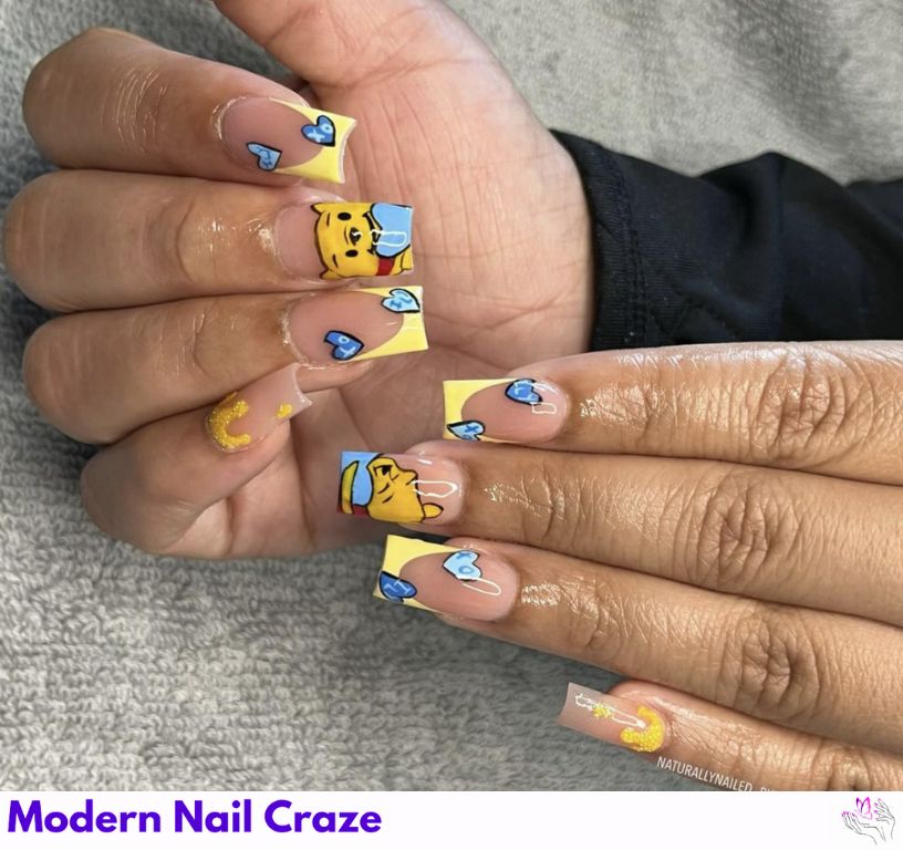 Yellow French Tips With Pooh – Yellow-tipped nails featuring tiny Pooh bear heads and bees.