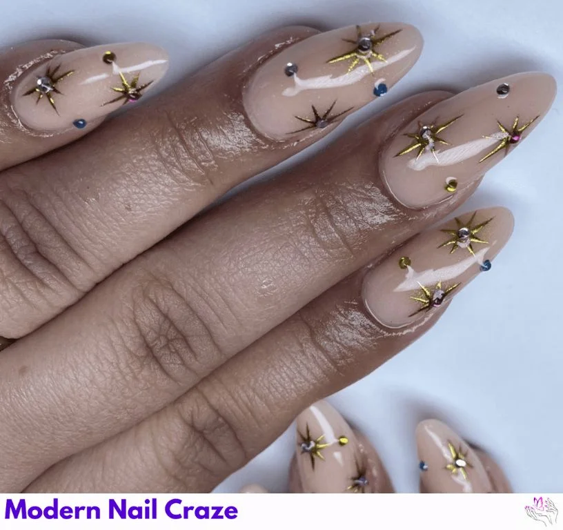 Almond-shaped nails with ombré gradients and cosmic designs