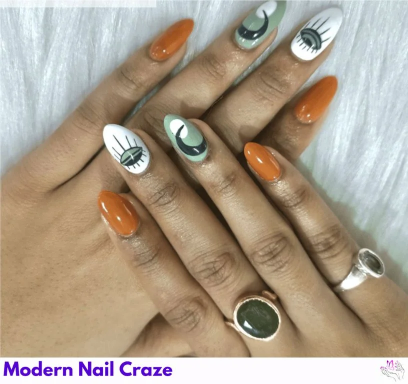 Astrology-themed nails with zodiac constellations and moonstone