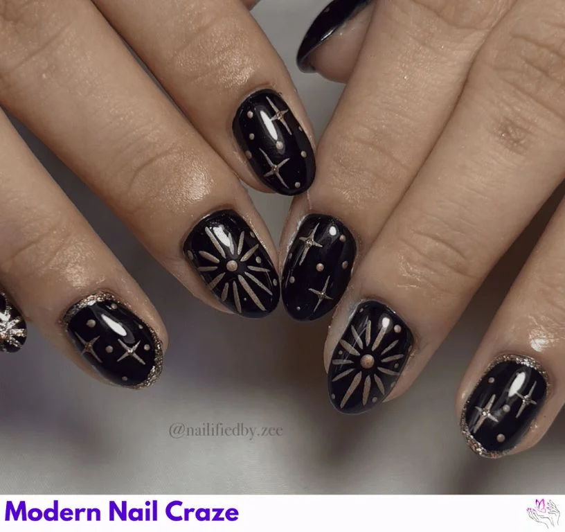 Deep indigo nails with 3D crystals and metallic star overlays