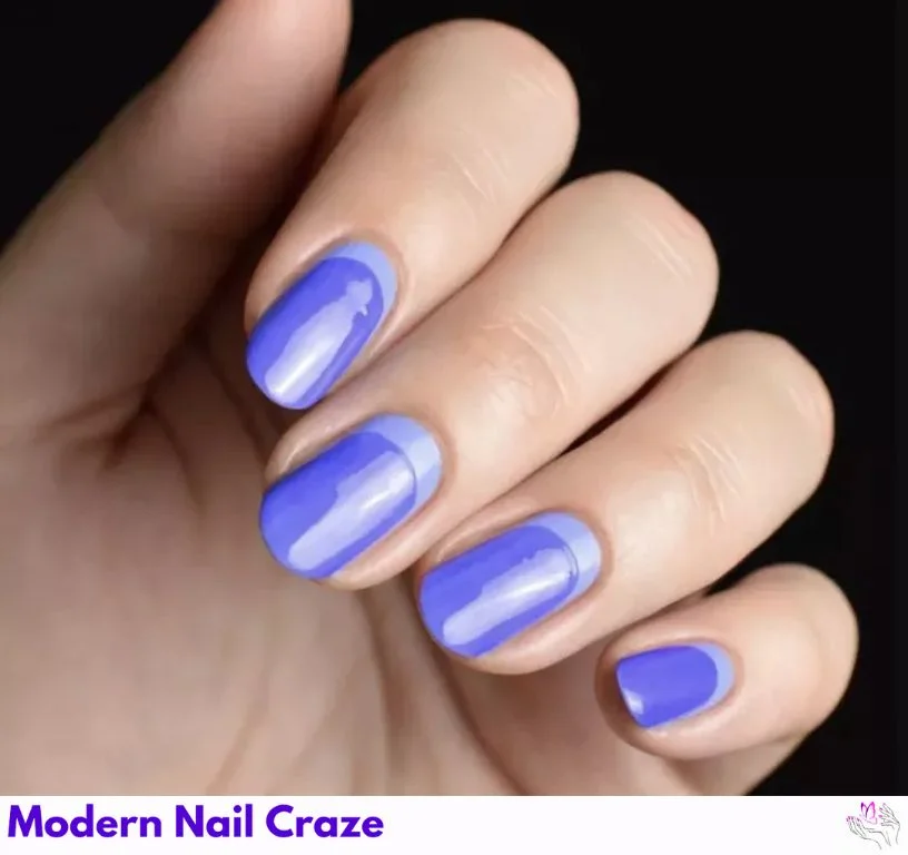 Two-tone blue half-moon manicure