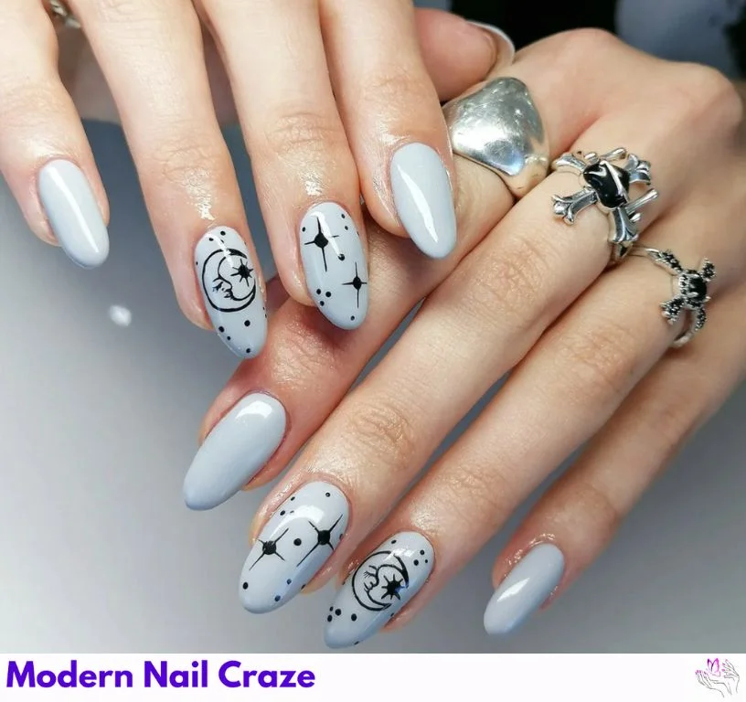 Minimalist gray nails with white stars and crescent moons