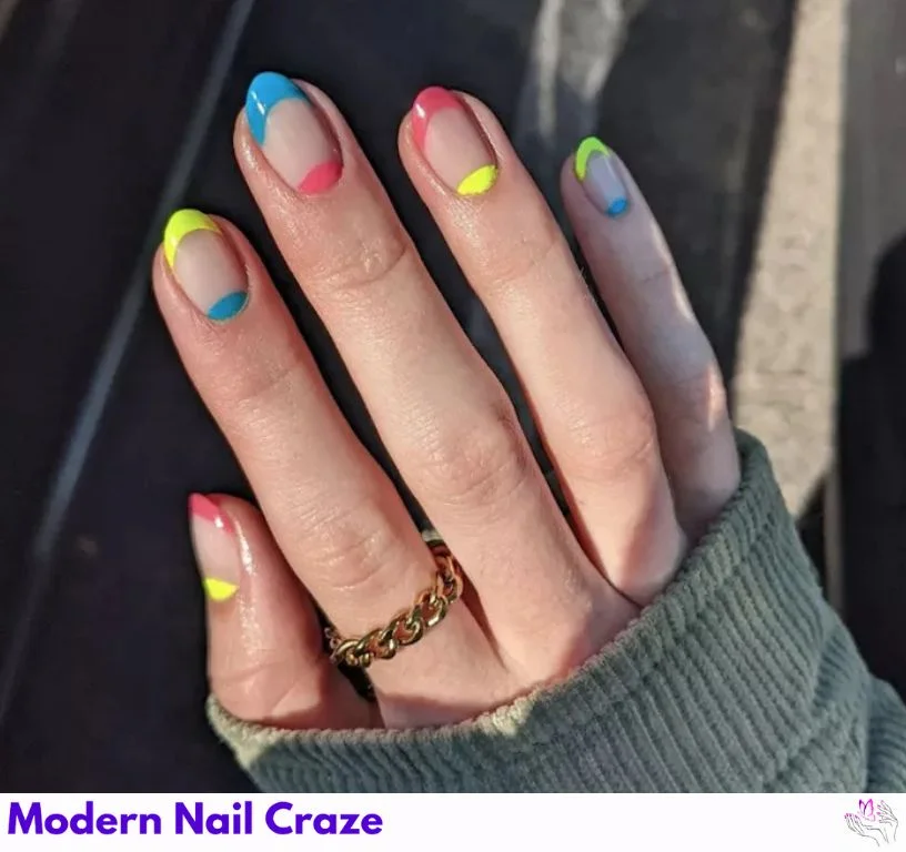 Neon yellow, blue, and pink French manicure with half-moon design