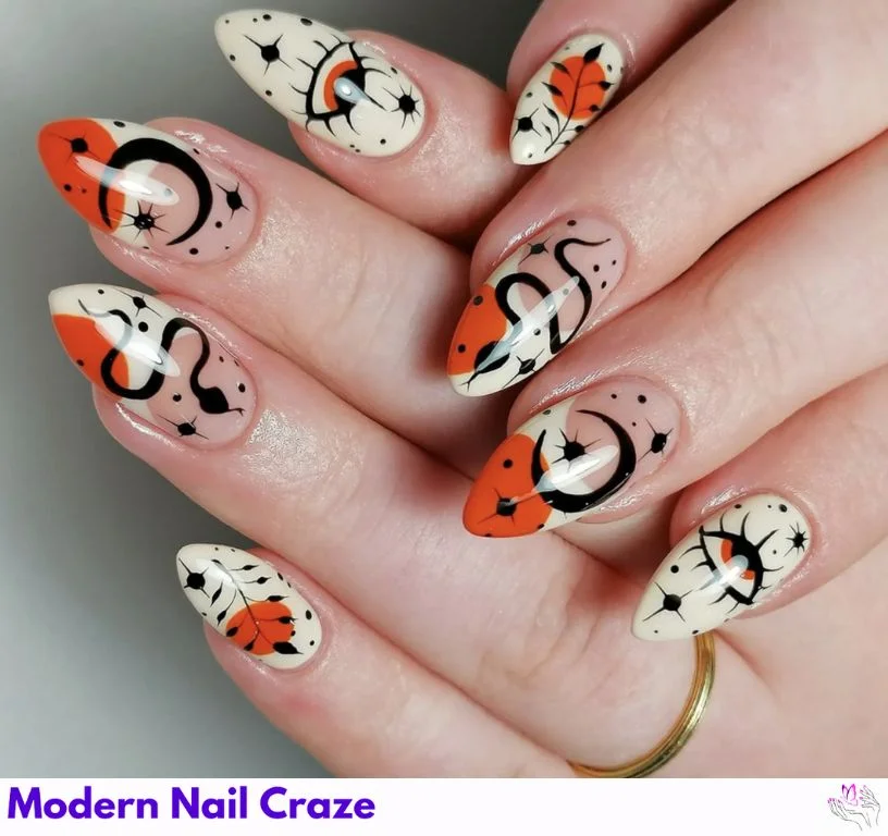 Nail art featuring evil eye charms and snake motifs