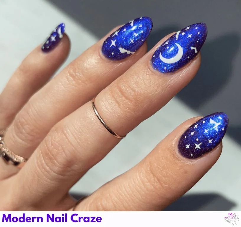 Matte navy nails with subtle gold star accents