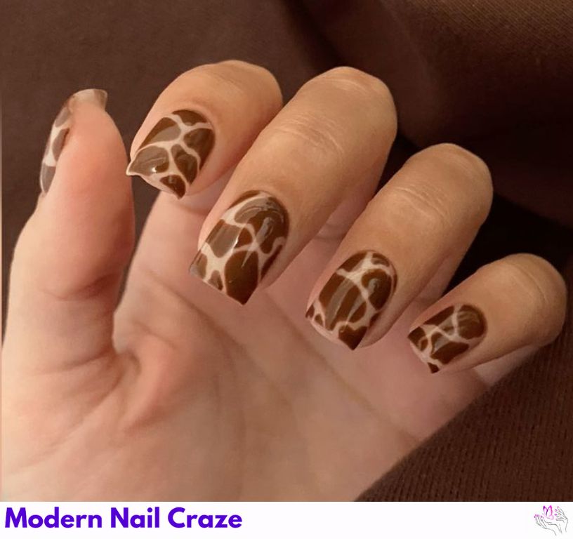 Earth-toned Giraffe Safari Nail Designs in khaki and brown nails with wild print