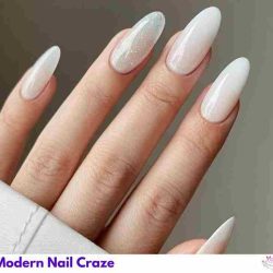 Elegant milky white nails with a soft glossy finish, perfect for a minimalist and chic look.